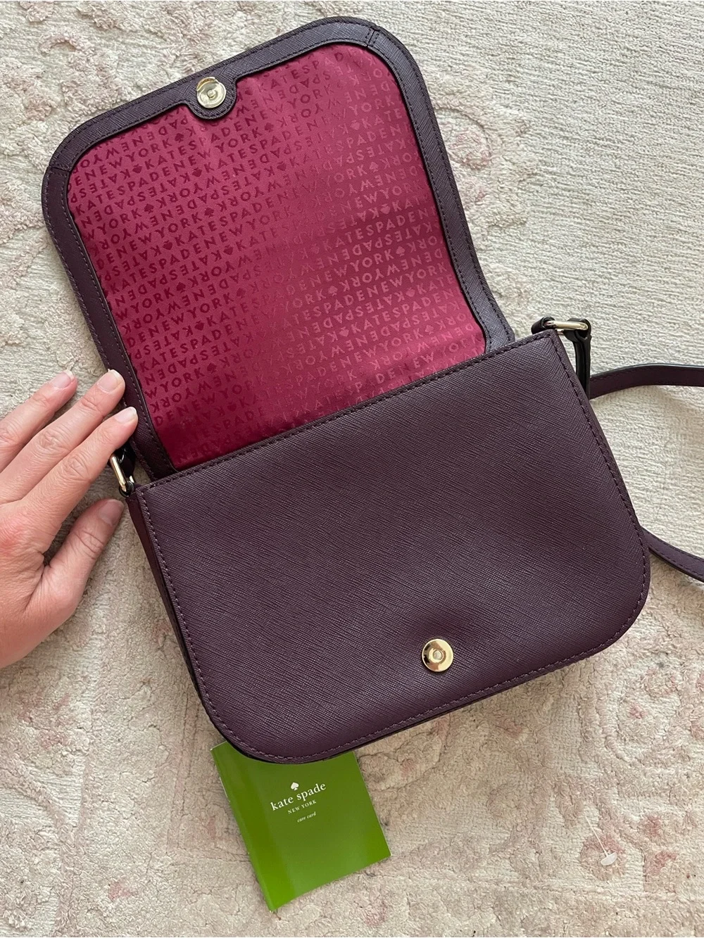 kate spade Laurel Lane Carson plum leather crossbody with gold hardware
